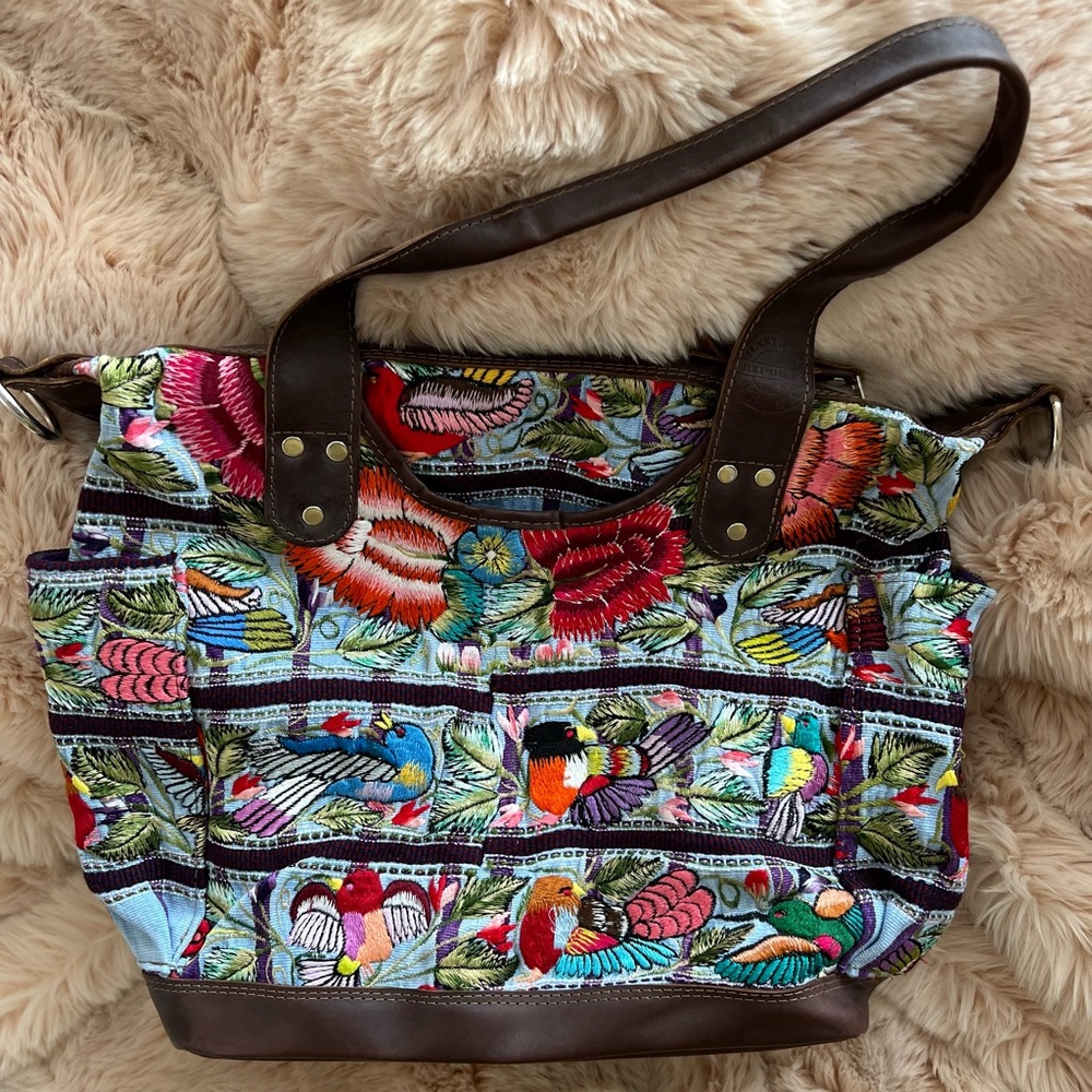 Hasta La Vista Exports-HLV  leather and embroidered crossbody/backpack bag.
